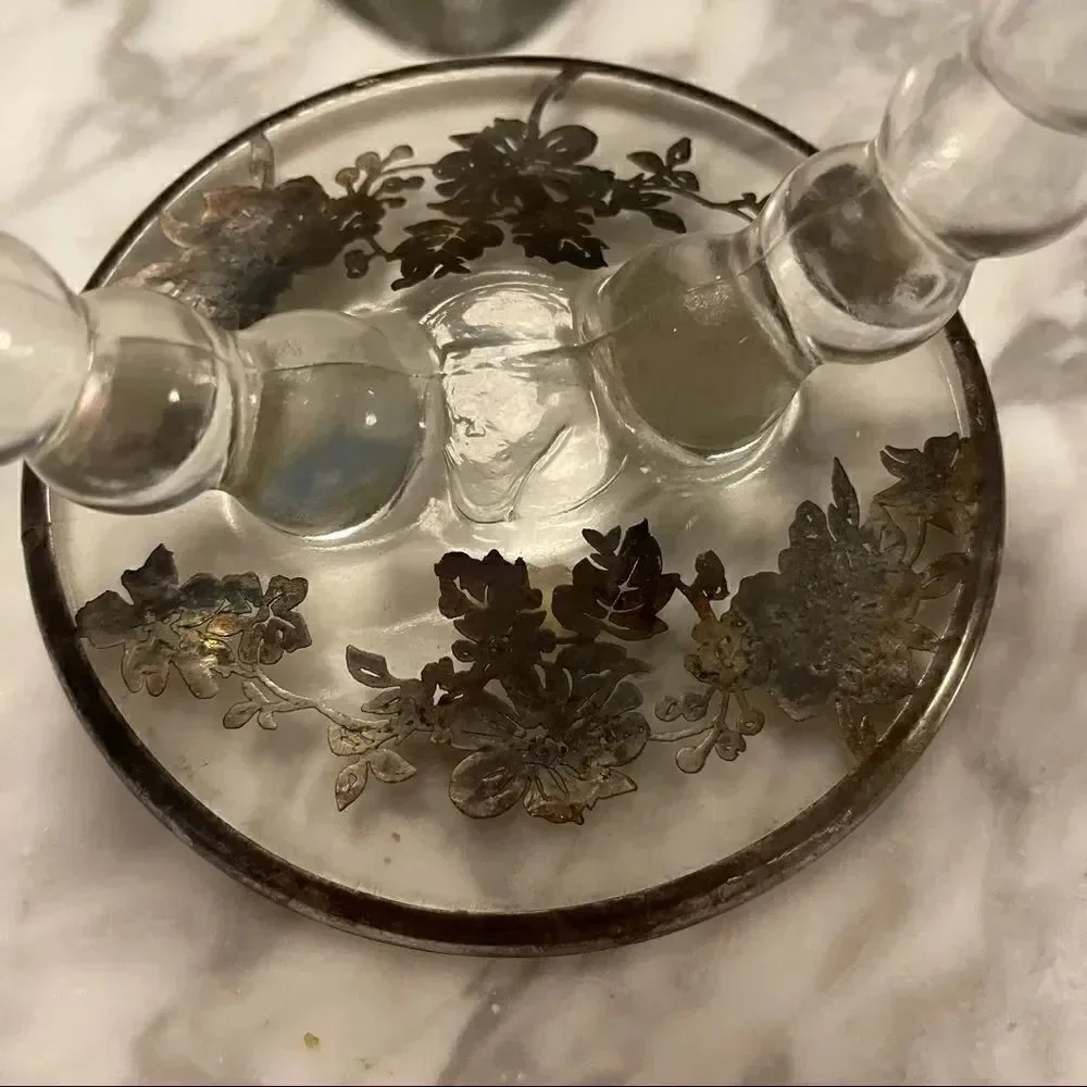 Pair of Circle Silver Overlay Floral Candesticks